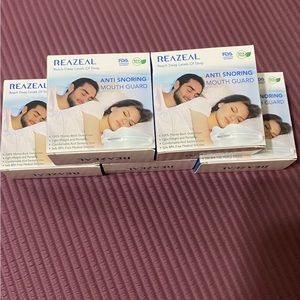 New in box lot of 5 ANTI SNORING MOUTHGUARDS. 5 mouthguards for the price of 1!